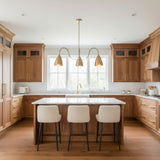 Marbella 3 light aged brass cone chandelier shown from a straight front view with symmetrical curved arms.