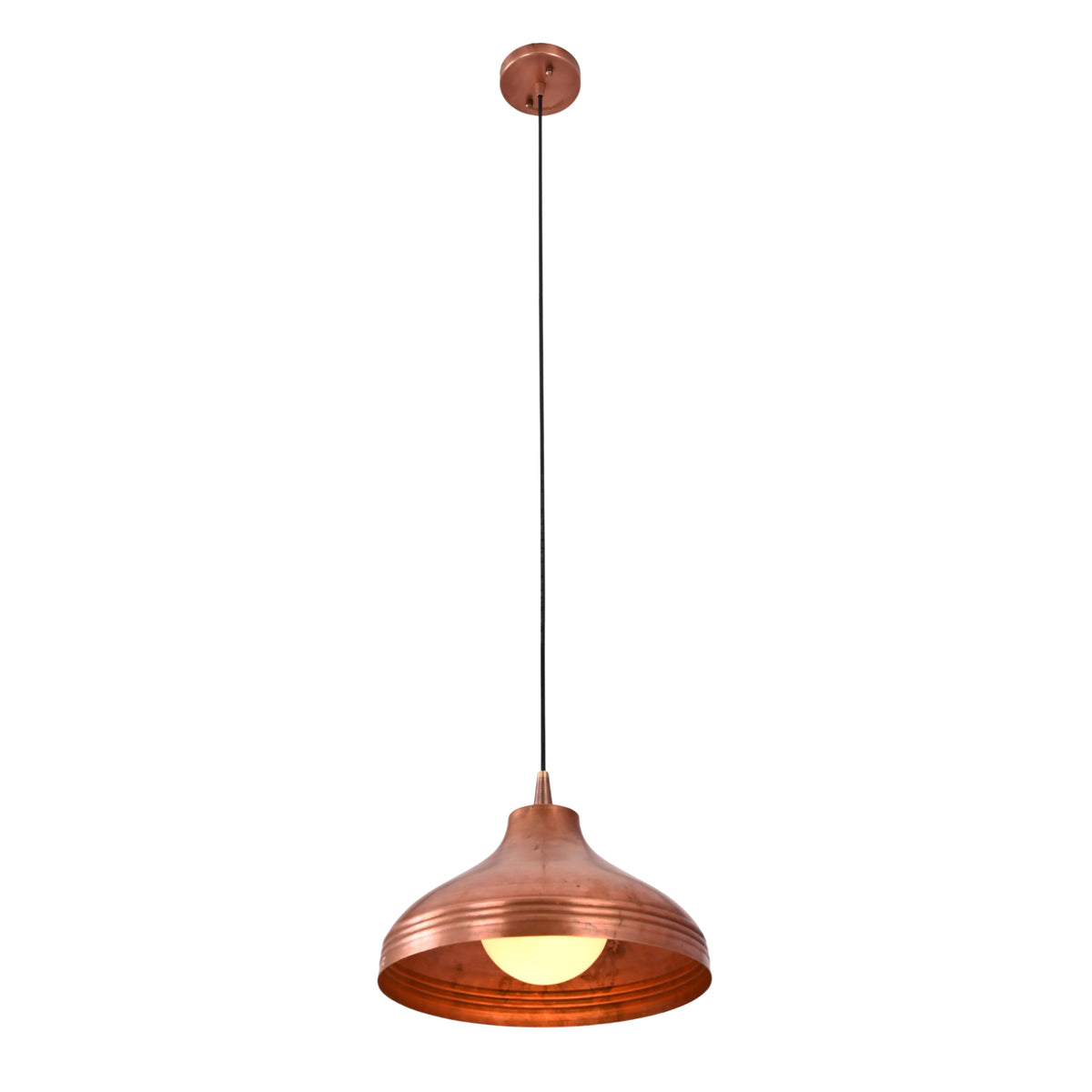 Angled view of the Marlow Copper Dome Pendant Light with warm illumination highlighting the handcrafted copper dome shade and industrial-inspired design.
