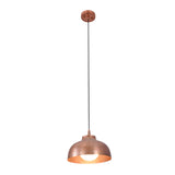 Illuminated view of the Marlow hammered copper dome pendant light showcasing its warm downward glow and hand-hammered copper dome shade.