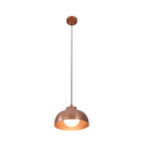 Front view of the Marlow hammered copper dome pendant light with warm ambient illumination highlighting its textured handcrafted copper finish.