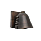 Close-up detail of the Marlow Riveted Dome Wall Sconce highlighting the artisan-finished bronze shade, rivet accents, and premium craftsmanship.