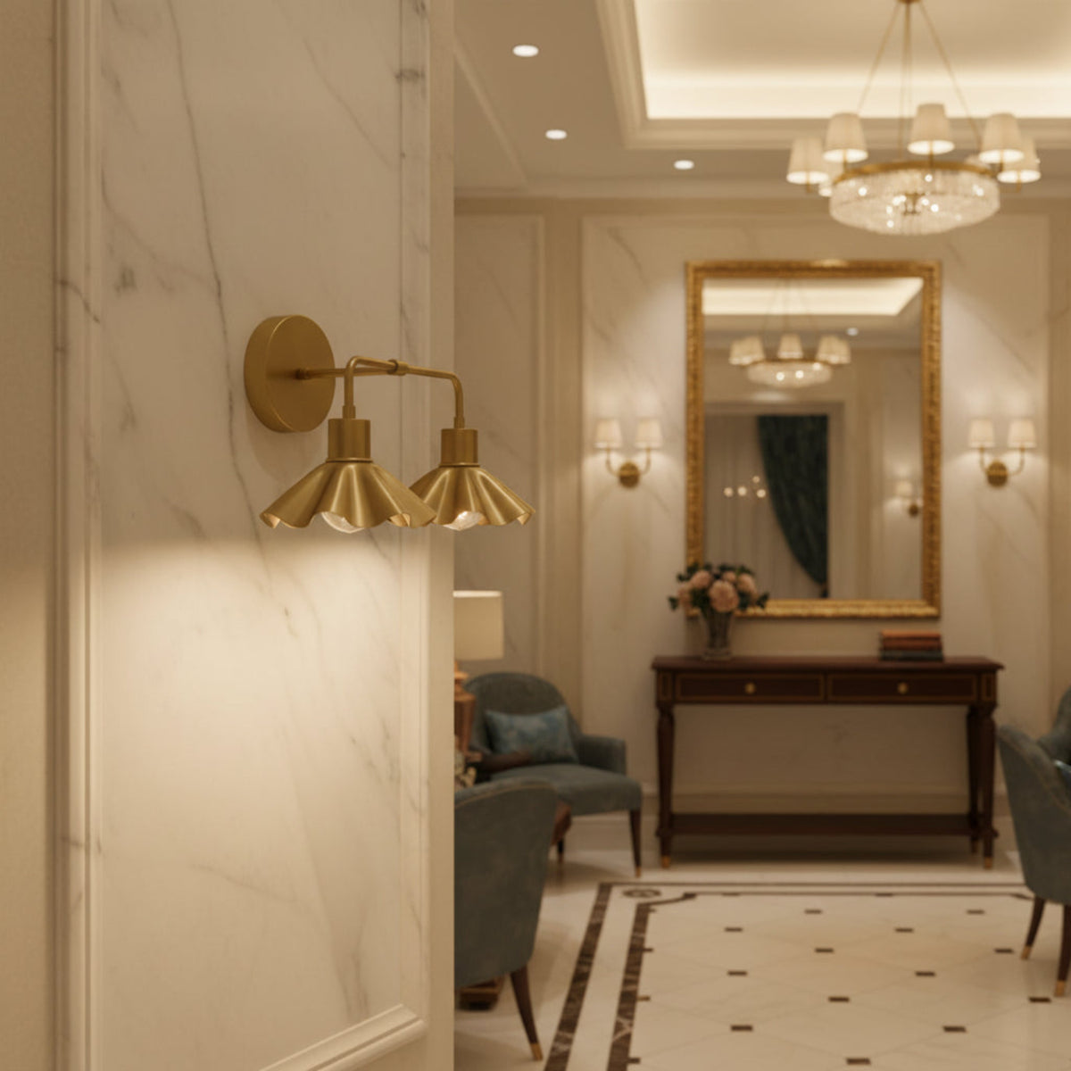 Marlow scalloped double wall sconce with two exposed warm bulbs and symmetrical brass shades shown from the front.