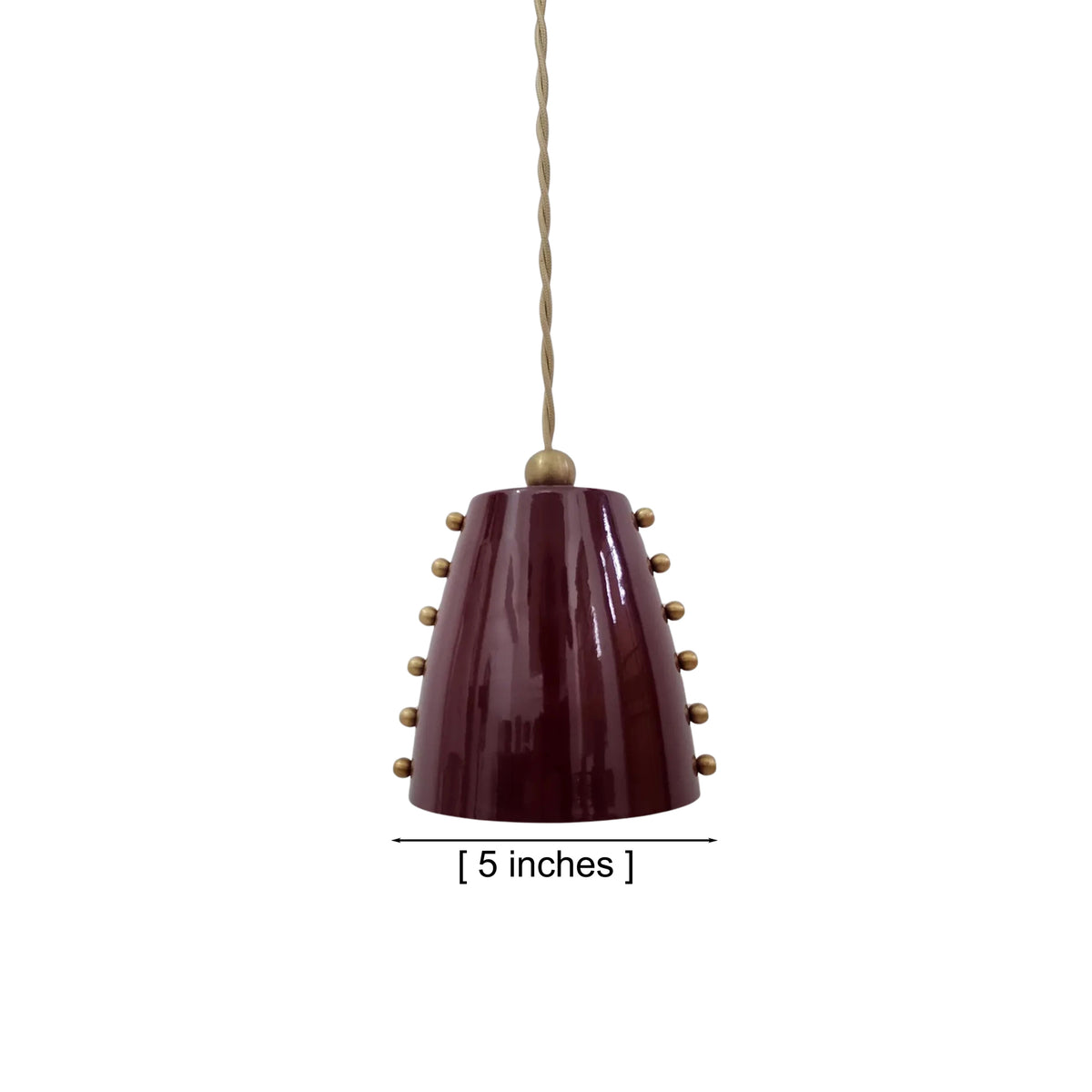 Dimension view of the Marlow 5-inch studded cone pendant light showing the glossy burgundy metal shade with decorative brass studs and adjustable hanging cord.