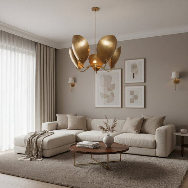 Mayfair 5 light aged brass sculptural chandelier shown from the front with curved petal-inspired metal shades.