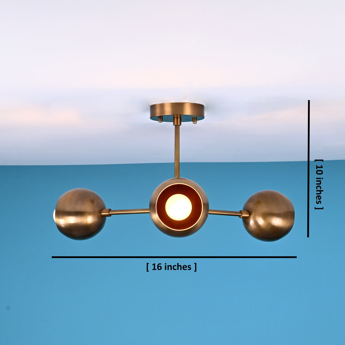 Brass 3-globe chandelier with 16-inch width and 10-inch height dimensions