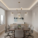 Melbourne 6 light chandelier shown from an alternate front view with exposed globe bulbs and geometric multi-directional arms.