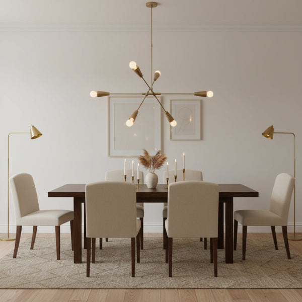 Melbourne 6 light Mid-Century Modern chandelier shown from the front with tapered cone holders, exposed globe bulbs, and sculptural brass-tone arms.