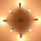Warm-lit 8-light mint cone starburst chandelier viewed from below