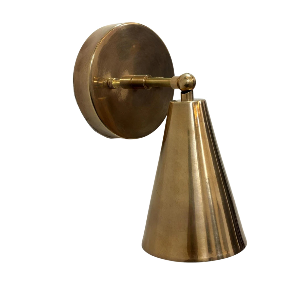 Milan adjustable solid brass wall sconce with handcrafted tapered cone metal shade shown in angled front view for modern Scandinavian interiors.