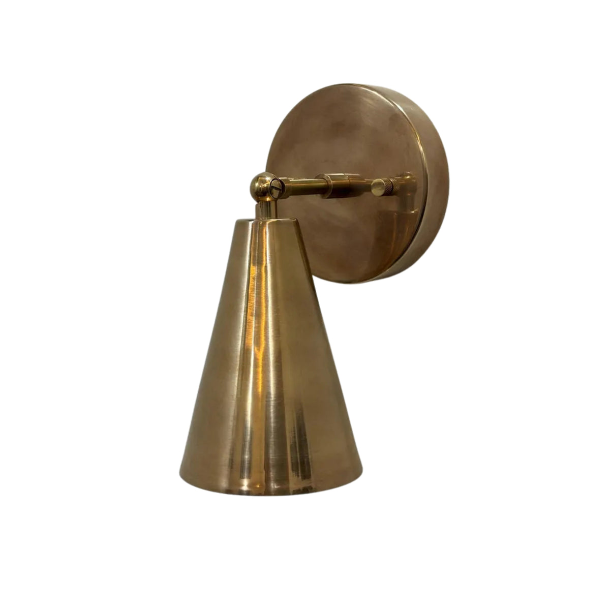 Side angle view of the Milan adjustable brass wall sconce featuring a handcrafted tapered cone metal shade and adjustable swivel arm.