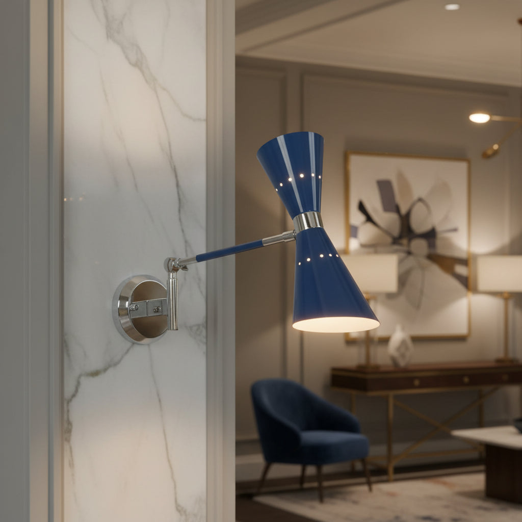 Angled view of Milan adjustable blue double cone wall sconce illuminated with warm light and polished metal details.