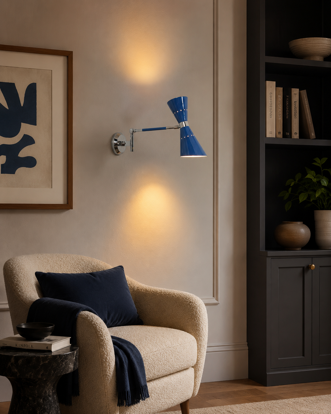 Milan adjustable blue double cone wall sconce with swing arm displayed in a modern living room reading corner.