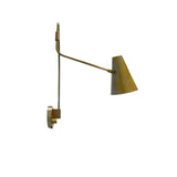 Side profile of the Milan Adjustable Swing Arm Wall Sconce displaying the slim adjustable arm and handcrafted tapered brass cone shade.