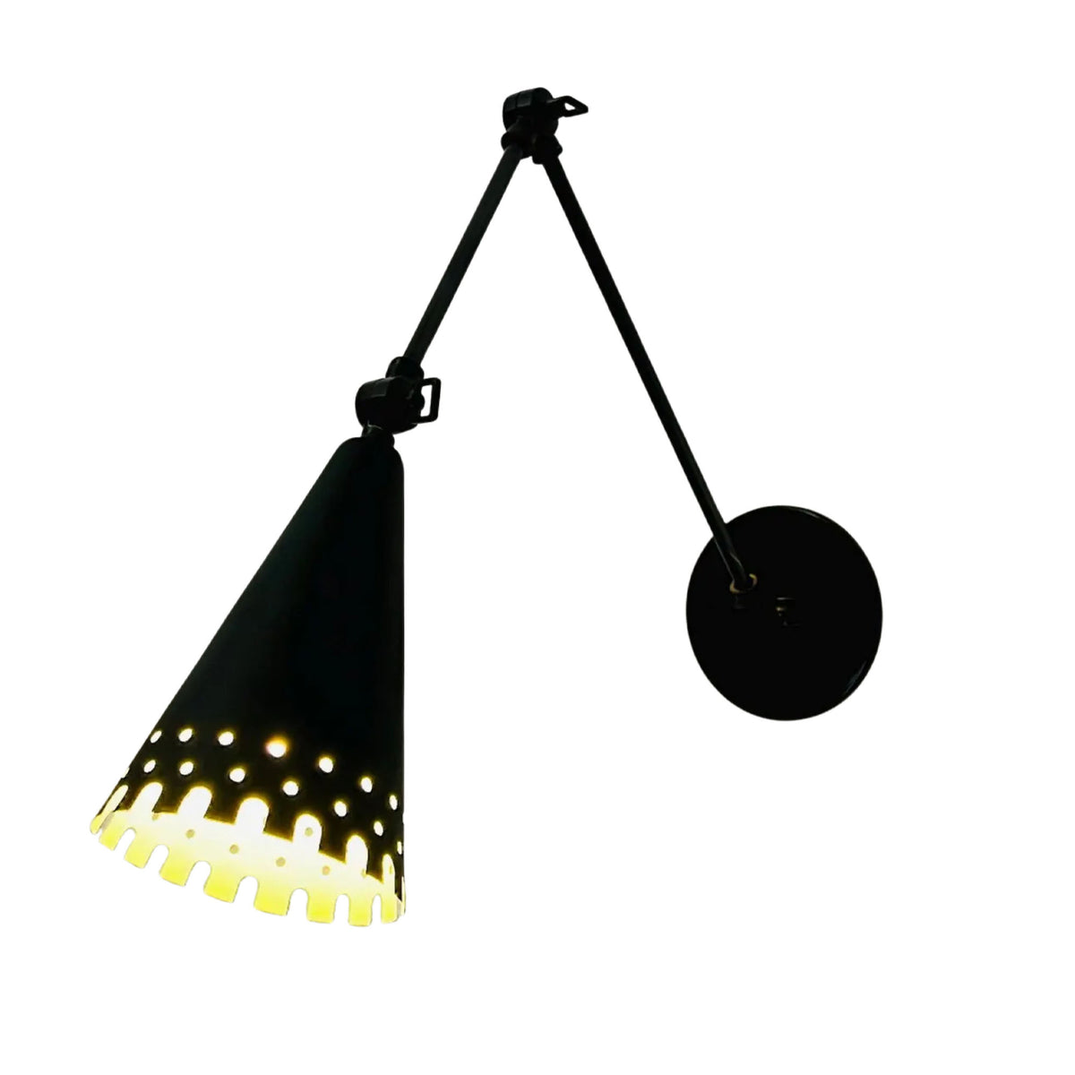 Angled view of Milan black swing arm wall sconce with warm illuminated cone shade and adjustable arms, Model 32784.