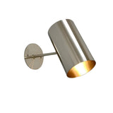 Milan angled cylinder wall sconce illuminated with warm downward light, Model 32752