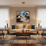 Angled view of Milan Azure 6 light chandelier featuring blue multi-cone shades and a brass-toned frame.