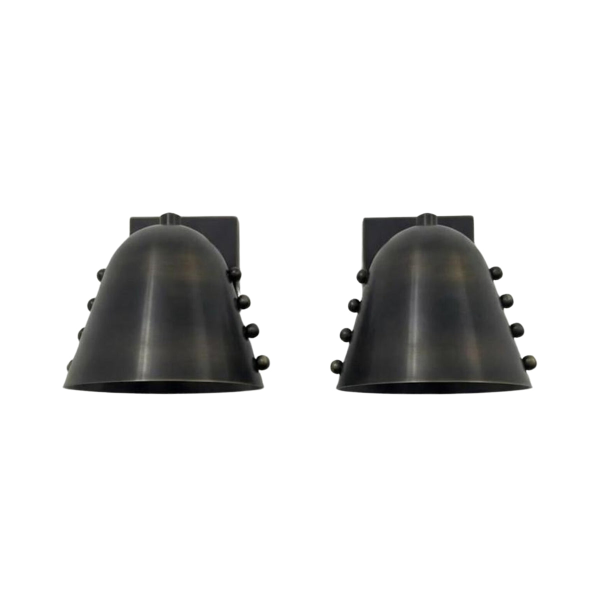 Angled side view of Milan black dome wall sconce featuring studded detailing and square wall backplate