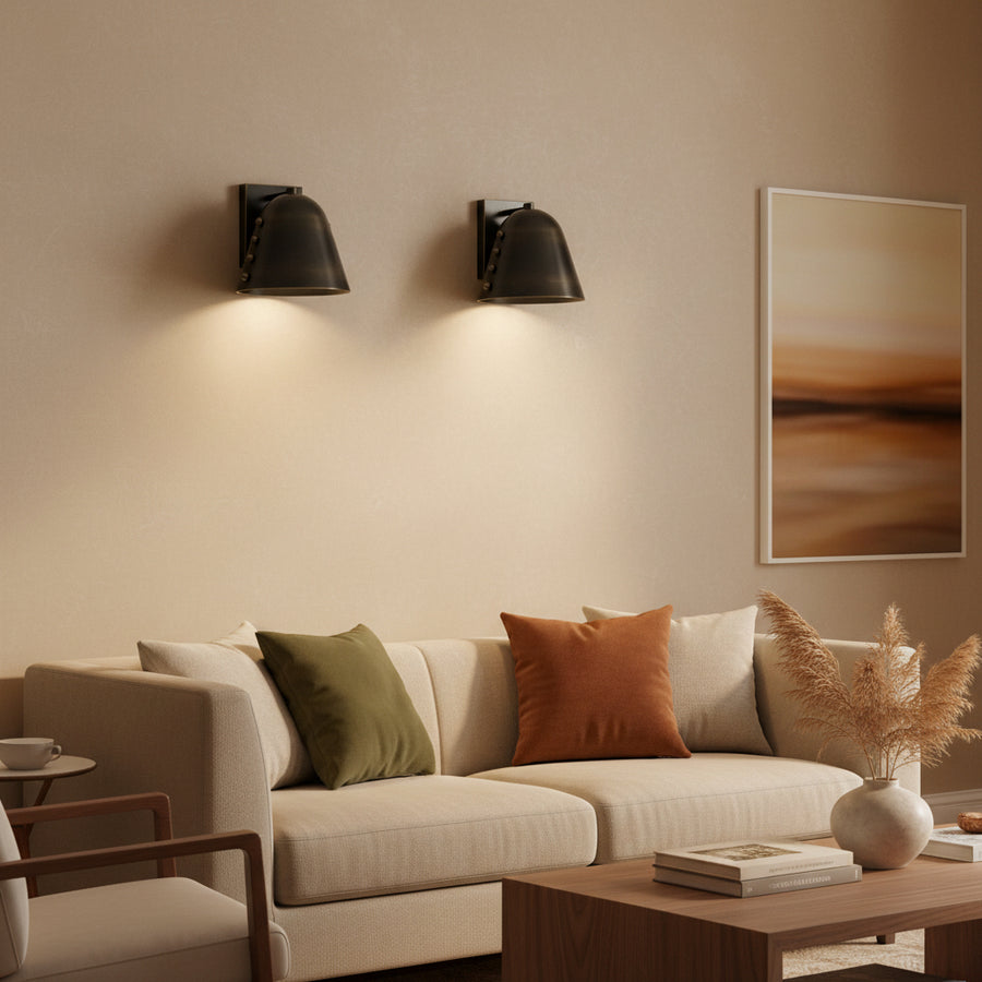 Set of two Milan black dome wall sconces with decorative stud details and square backplates, Model 32815
