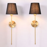 Pair of Milan black shade rod wall sconces with tall slim frames and round backplates.
