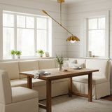Full view of Milan counterbalance ceiling pendant with long asymmetric arm, weighted end and pleated brass dome shade.