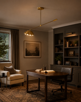 Milan counterbalance pleated dome pendant installed in a home office above a wooden desk with warm ambient lighting.
