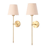 Pair of Milan cream shade rod wall sconces with slim golden frames and round backplates.