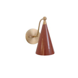 Front view of the Milan Curved Arm Cone Wall Sconce featuring a handcrafted terracotta tapered cone shade with a solid brass curved arm and round wall canopy.