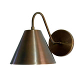 Front angled view of Milan curved arm cone wall sconce with warm metal finish, Model 32791
