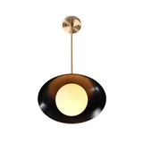 Milan Disc pendant with black dome shade and glowing globe diffuser in a clean Mid-Century Modern design.