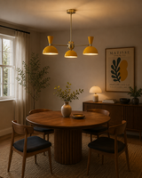 Milan 3 light mustard yellow dome chandelier displayed above a round wooden dining table in a warm Mid-Century Modern dining room – Model 62027
