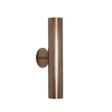 Side view of Milan perforated brass cylinder wall sconce showing round wall canopy and slim projection.