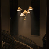 Milan 5 light chandelier featuring staggered ivory fabric cone shades and slender brass arms – Model 62026