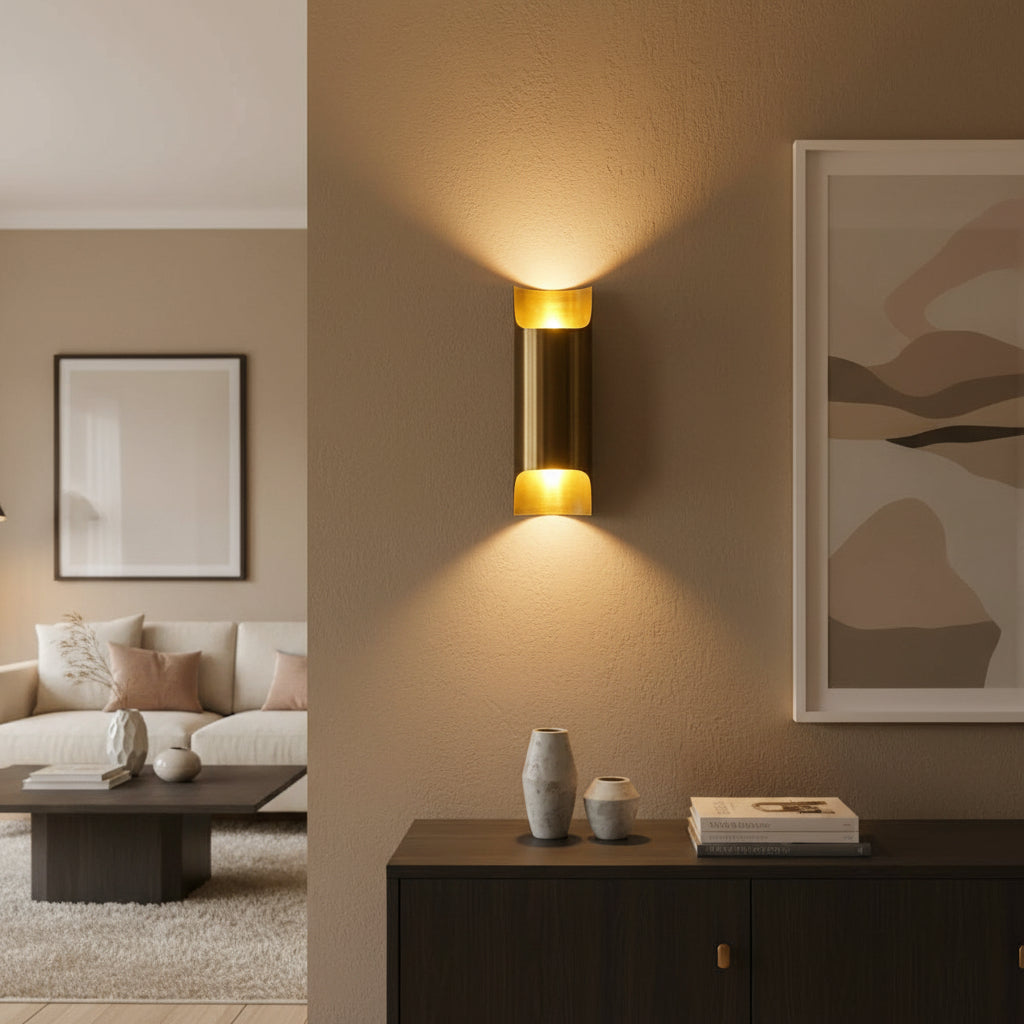 Milan sculptural brass up and down wall sconce with warm illumination, front view – Model 32807