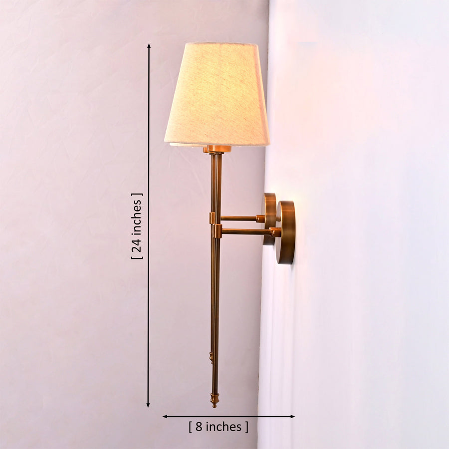 Milan Shade Rod Wall Sconce pair installed beside wall art in a warm modern living room interior.