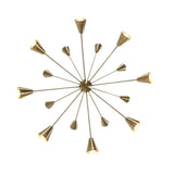 Angled view of Milan 16 light starburst chandelier with tapered brass cone shades and radiating arms