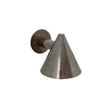 Rear angled view of the Milan Tapered Cone Wall Sconce highlighting the handcrafted metal shade, cylindrical wall arm, and round mounting canopy.