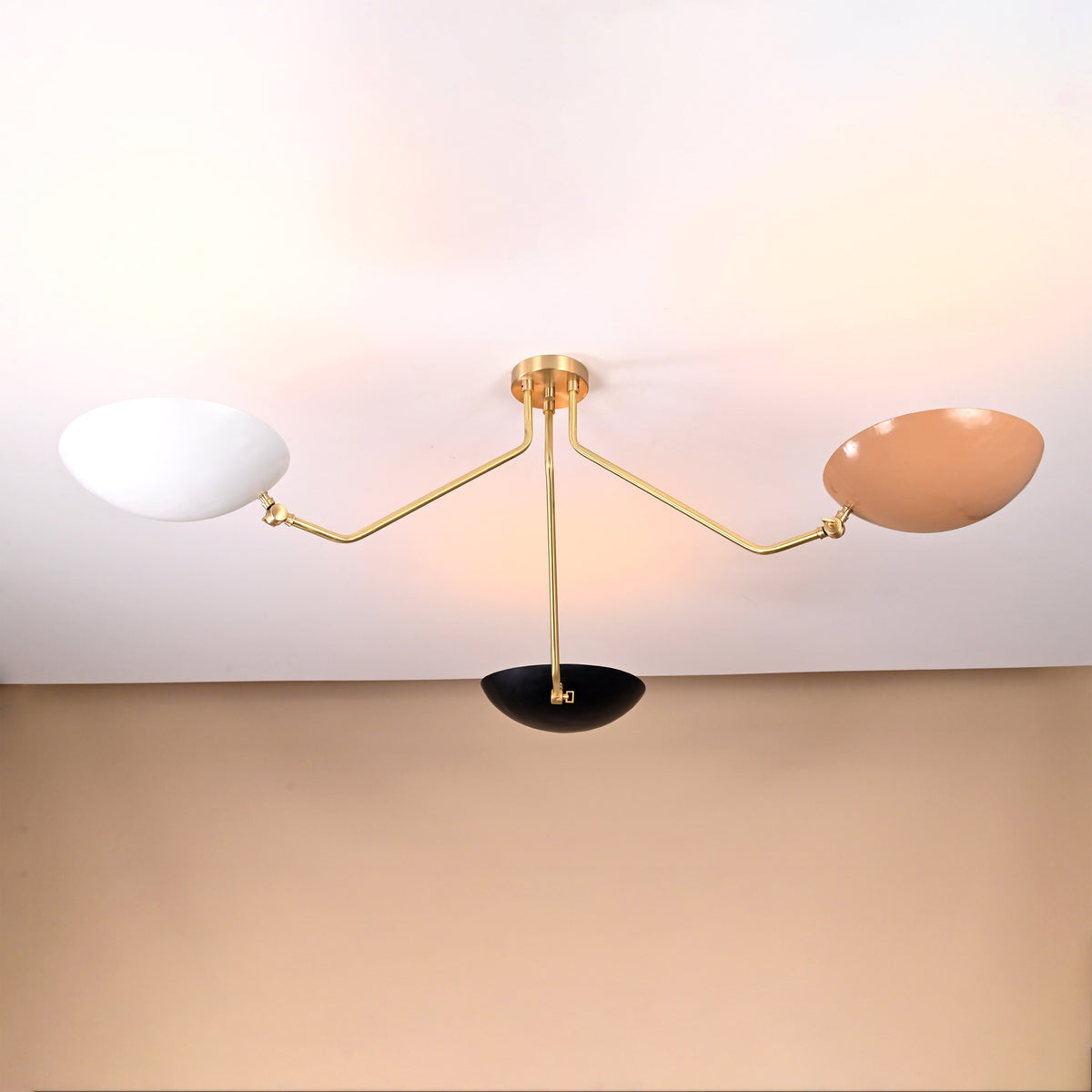 Minimalist brass 3-light ceiling fixture with tri-color bowl reflectors — modern flushmount design