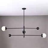 Modern 3-light matte black orb balance chandelier with brass arms – front view