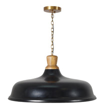 Modern industrial black pendant light with wood accent and brass ceiling chain, combining rustic warmth with sleek matte finish design.