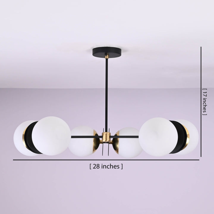 6-light chandelier with brass and black finish, shown with size dimensions 28 inches wide by 17 inches high, featuring round opal glass shades.