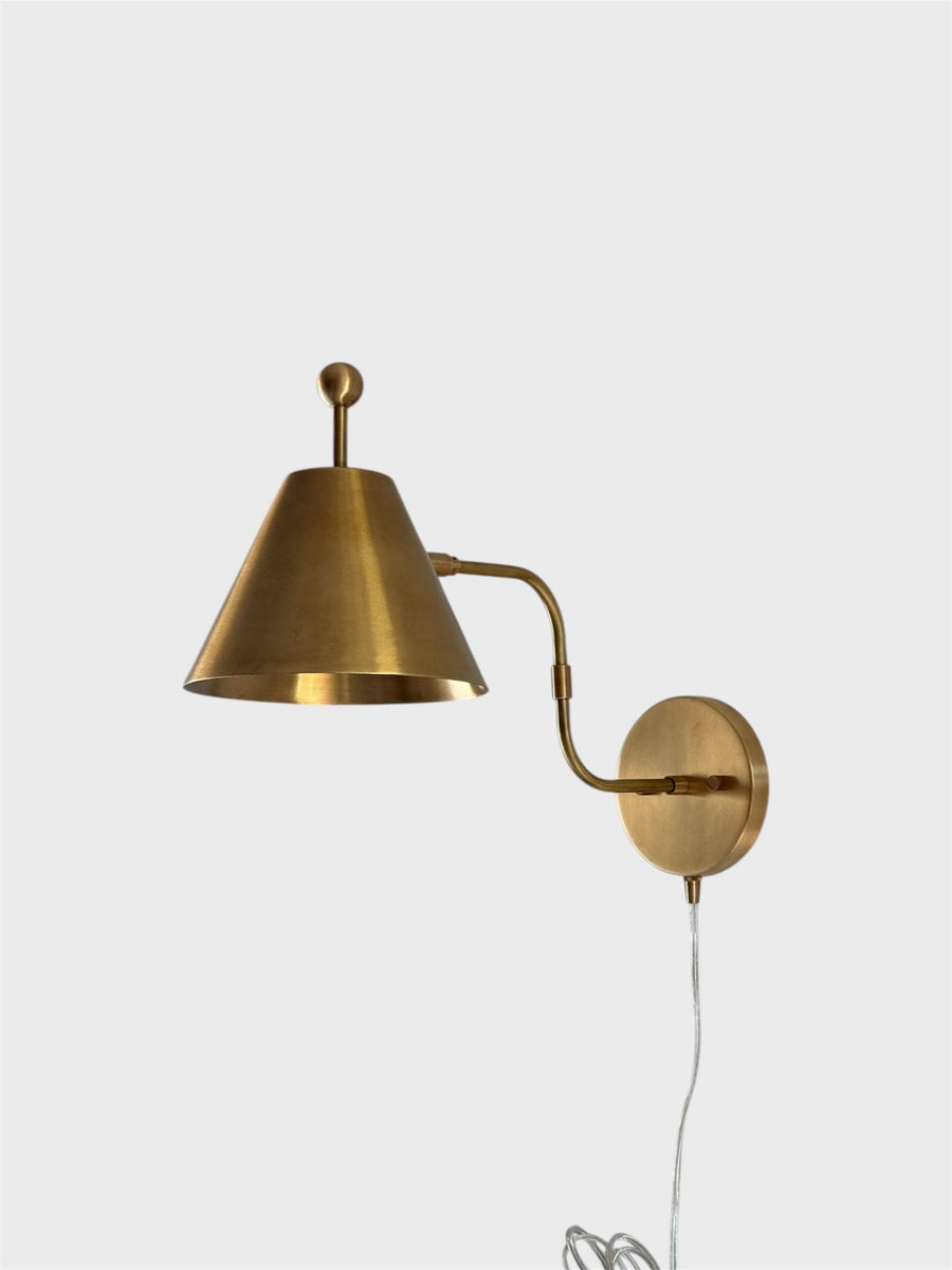 Modern Brass Cone Wall Sconce With Plug-In Cord, Brushed Brass Finish, Minimal Adjustable Arm Wall Light On White Background