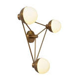 Vertical angled view of 3-light brass chandelier featuring opal glass globes and sleek triangular brass arms for modern, ambient lighting.