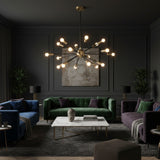 Monaco 18 light Sputnik chandelier featuring black radiating arms with brass bulb holders and central accent.