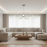 Monaco 18 light Sputnik chandelier in satin nickel finish with sculptural radiating arms and illuminated globe bulbs.