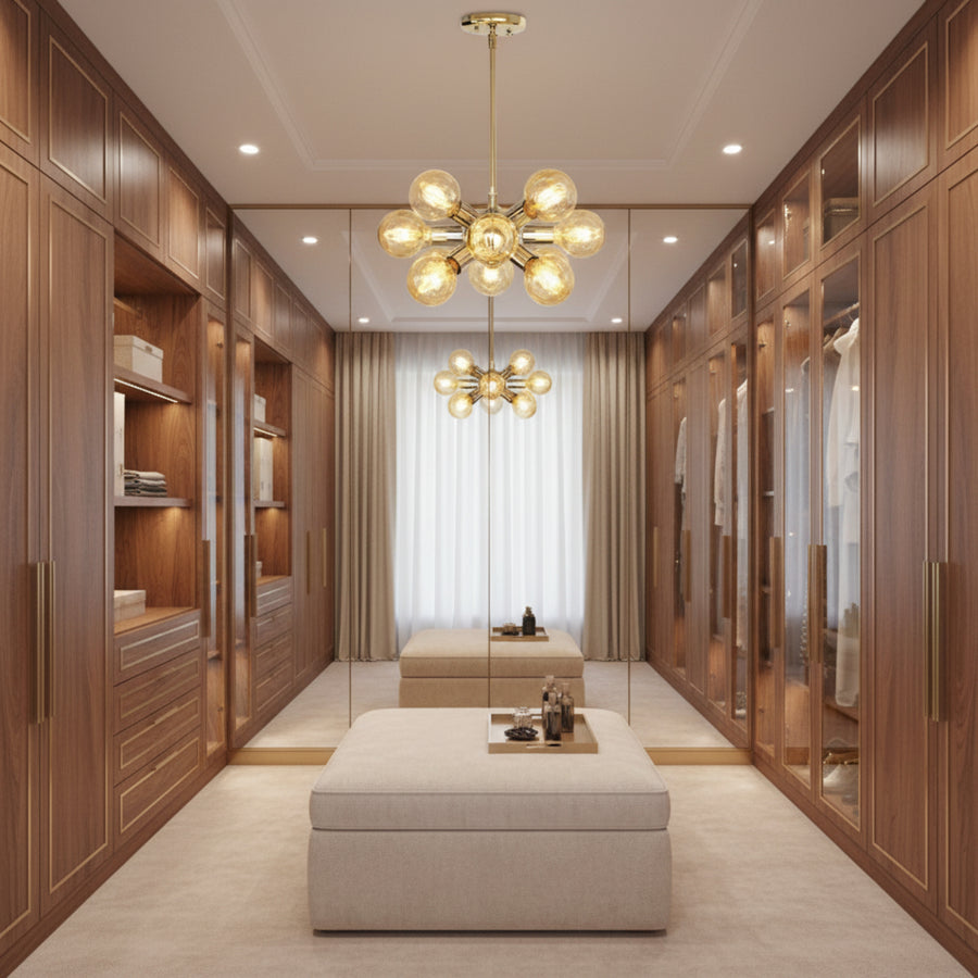 Monaco 12 light starburst chandelier shown from the front with polished metallic holders, exposed bulbs, straight downrod, and round ceiling canopy.