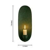Dimension illustration of the Monroe oval backplate candle wall sconce showing 10.6-inch height and 4.3-inch width.
