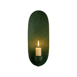 Front view of the Monroe modern oval backplate candle wall sconce in a deep green finish featuring an elongated backplate and candle-style holder.