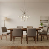 Montpellier 12 light Mid-Century Modern Sputnik chandelier featuring white tapered cone shades and a silver-tone metal frame.