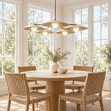 Munich 5 light Mid-Century Modern chandelier shown from an angled view with ivory saucer shades and white globe diffusers.