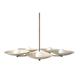 Munich 5 light sculptural chandelier shown from a low side view with shallow ivory disc shades and white globe lights.